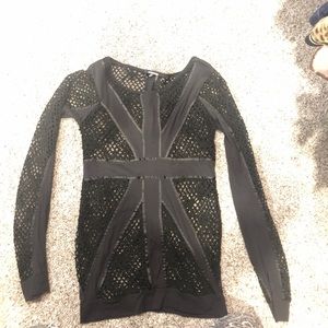 Edgy black top